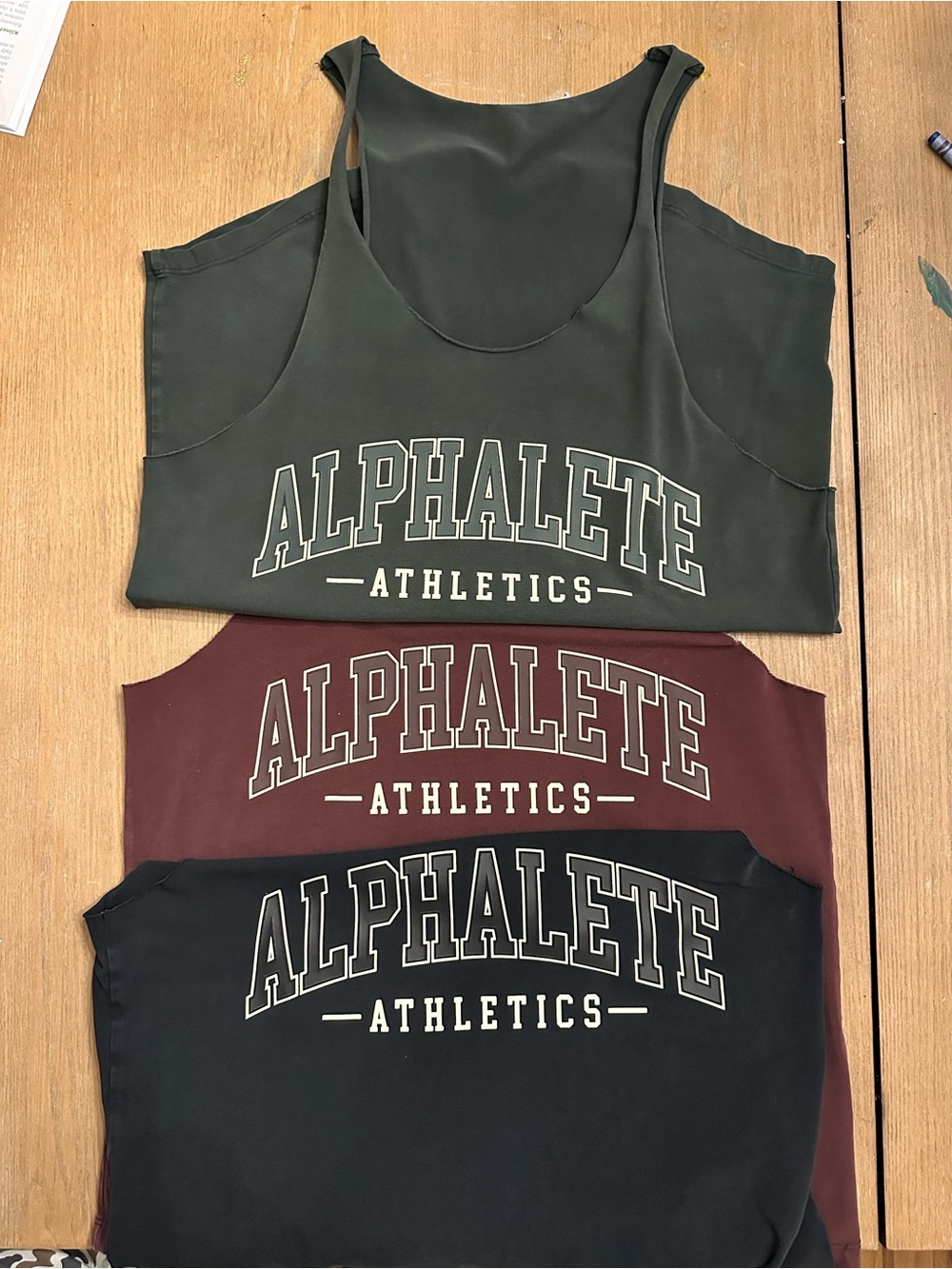 Alphalete men’s stringer tanks Trio - Olive, Maroon, Black
